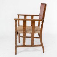 Liberty & Co. An Arts & Crafts Rush Seat Armchair with a Shaped Back - Thumbnail 5