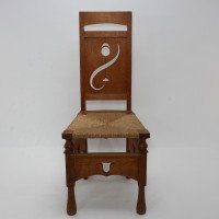 M. H. Baillie Scott, attributed. An Arts & Crafts Oak Chair with Stylized Floral Cut-outs - Thumbnail 2