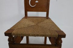 M. H. Baillie Scott, attributed. An Arts & Crafts Oak Chair with Stylized Floral Cut-outs - Thumbnail 10