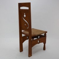 M. H. Baillie Scott, attributed. An Arts & Crafts Oak Chair with Stylized Floral Cut-outs - Thumbnail 20