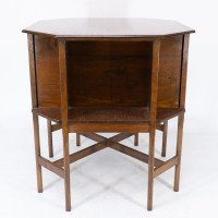 Ambrose Heal's attri. An Arts & Crafts Oak octagonal book table with eight legs - Thumbnail 2