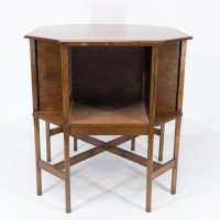 Ambrose Heal's attri. An Arts & Crafts Oak octagonal book table with eight legs - Thumbnail 4