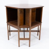 Ambrose Heal's attri. An Arts & Crafts Oak octagonal book table with eight legs - Thumbnail 3
