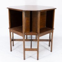 Ambrose Heal's attri. An Arts & Crafts Oak octagonal book table with eight legs - Thumbnail 7