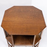Ambrose Heal's attri. An Arts & Crafts Oak octagonal book table with eight legs - Thumbnail 10