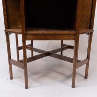 Ambrose Heal's attri. An Arts & Crafts Oak octagonal book table with eight legs - Thumbnail 16