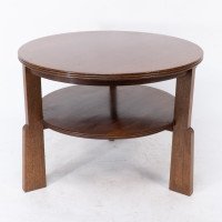 Gordon Russell. A gunstock figured walnut coffee table on gunstock shaped legs - Thumbnail 1