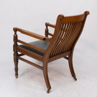 James Peddle, attributed. An Aesthetic Movement Oak Armchair with Serpentine Shaped Back - Thumbnail 17