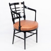 James Plucknett Attributed, probably for Collier & Plucknett. A Jacobean/Old English Aesthetic Movement Armchair