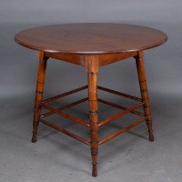 Collinson & Lock, attributed. A Walnut Centre Table with Incised Circular Details to the Legs - Thumbnail 3