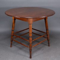 Collinson & Lock, attributed. A Walnut Centre Table with Incised Circular Details to the Legs - Thumbnail 5
