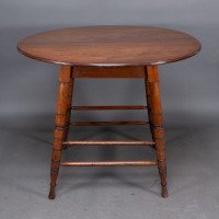 Collinson & Lock, attributed. A Walnut Centre Table with Incised Circular Details to the Legs - Thumbnail 6