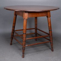 Collinson & Lock, attributed. A Walnut Centre Table with Incised Circular Details to the Legs - Thumbnail 9