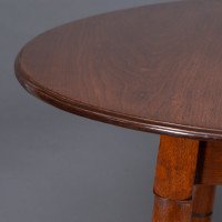 Collinson & Lock, attributed. A Walnut Centre Table with Incised Circular Details to the Legs - Thumbnail 10