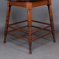 Collinson & Lock, attributed. A Walnut Centre Table with Incised Circular Details to the Legs - Thumbnail 11