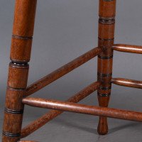 Collinson & Lock, attributed. A Walnut Centre Table with Incised Circular Details to the Legs - Thumbnail 13