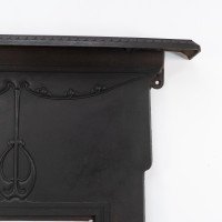 An Arts & Crafts/Art Nouveau Cast Iron Fireplace with Stylized Floral Details - Thumbnail 9