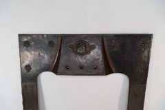 A Large Arts & Crafts Copper Fire Insert with a Lion in a Shield Crest - Thumbnail 2