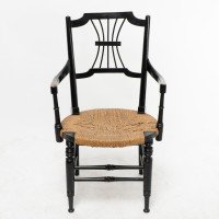Liberty & Co., An English Aesthetic Movement Ebonized Armchair with Seagrass Seat - Thumbnail 2