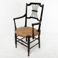 Liberty & Co., an English Aesthetic Movement Ebonised Armchair with Seagrass Seat - Thumbnail 3