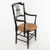 Liberty & Co., An English Aesthetic Movement Ebonized Armchair with Seagrass Seat - Thumbnail 5
