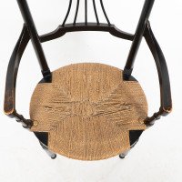 Liberty & Co., An English Aesthetic Movement Ebonized Armchair with Seagrass Seat - Thumbnail 10