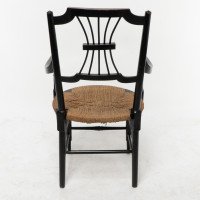 Liberty & Co., An English Aesthetic Movement Ebonized Armchair with Seagrass Seat - Thumbnail 15
