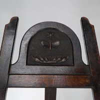 An Arts & Crafts folding oak easel with a carved butterfly flying from a flower  - Thumbnail 8