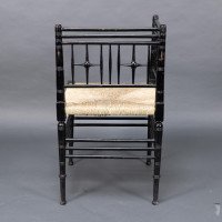 Liberty & Co. Aesthetic Movement ebonized corner armchair from the Argyll suite - Thumbnail 4