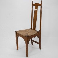 Shapland & Petter. A Pair of Arts & Crafts Oak Dining Chairs with Pierced Hearts - Thumbnail 3