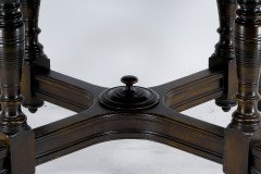 Maple & Co., A Gothic Revival Oak Leather Top Writing Table on Decorative Castors - Thumbnail 9