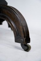 Maple & Co., A Gothic Revival Oak Leather Top Writing Table on Decorative Castors - Thumbnail 18