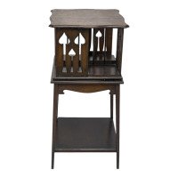 Liberty & Co., Arts & Crafts Oak Revolving Bookcase with Stylised Floral Cut-out Decoration - Thumbnail 4