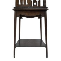 Liberty & Co., An Arts & Crafts Oak Revolving Bookcase with Stylized Floral Cut-out Decoration - Thumbnail 7