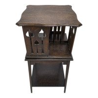 Liberty & Co., Arts & Crafts Oak Revolving Bookcase with Stylised Floral Cut-out Decoration - Thumbnail 10