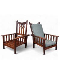 Liberty & Co., attributed. An Arts and Crafts Reclining Armchair with Carved Floral Details - Thumbnail 1
