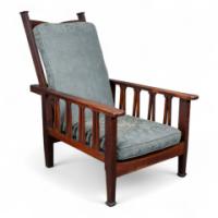 Liberty & Co., attributed. An Arts and Crafts Reclining Armchair with Carved Floral Details - Thumbnail 2