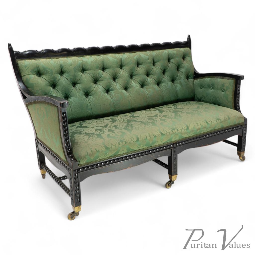 E. W. Godwin, attributed. An Anglo-Japanese Ebonized Duet or Conversation Settee