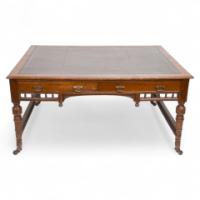 Alfred Waterhouse, Style of. A Gothic Revival Oak Partners Desk with Two Drawers Each Side