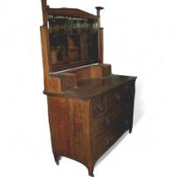 A Well-Crafted Oak Arts & Crafts Dressing Table with Stylised Floral Carving to the Top
