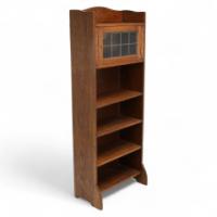 Liberty & Co., an English Arts & Crafts Oak Bookcase, with Shaped Upper Details