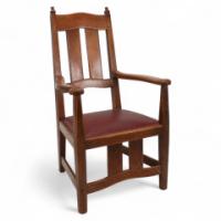 W. R. Lethaby. A Rare Arts & Crafts Sculptured Oak Armchair with Shaped Arms