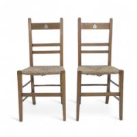 230_liberty-a-pair-of-arts-crafts-oak-rush-seat-chairs-inlaid-with-pewter-hearts