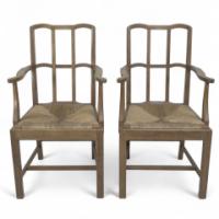 Heal's attributed. A Pair of Cotswold School Arts & Crafts Oak Lattice Back Armchairs