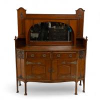 Liberty & Co. Attributed, an English Arts & Crafts Oak Sideboard with Carved Decoration