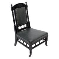 Gregory & Co., an Aesthetic Movement Nursing Chair with Stylized Carved Sunflower