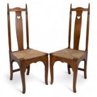 788_shapland-petter-a-pair-of-arts-crafts-oak-dining-chairs-with-pierced-hearts