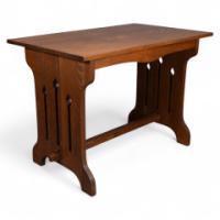 Liberty & Co. Attributed, a Small Arts & Crafts Oak Dining Table