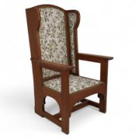 E. G. Punnett Attributed, probably by William Birch & Retailed by Goodyers. An Arts & Crafts Oak Wing Back Hall Armchair