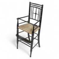 Liberty & Co. An Argyle Aesthetic Movement Ebonised rush seat child's high chair - Thumbnail 1